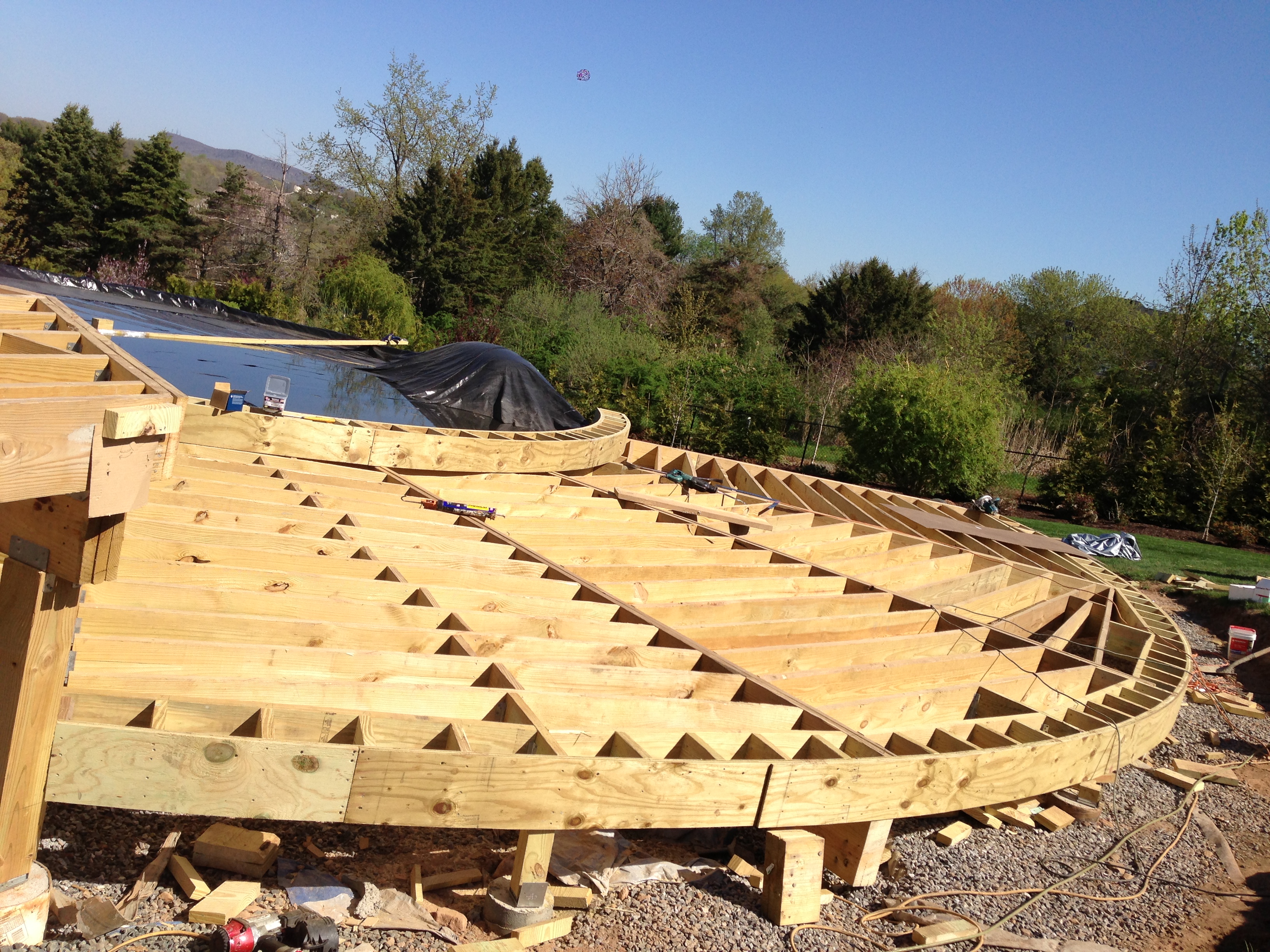 PT Frame for Round Pool Deck, custom laminated PT beams curved.